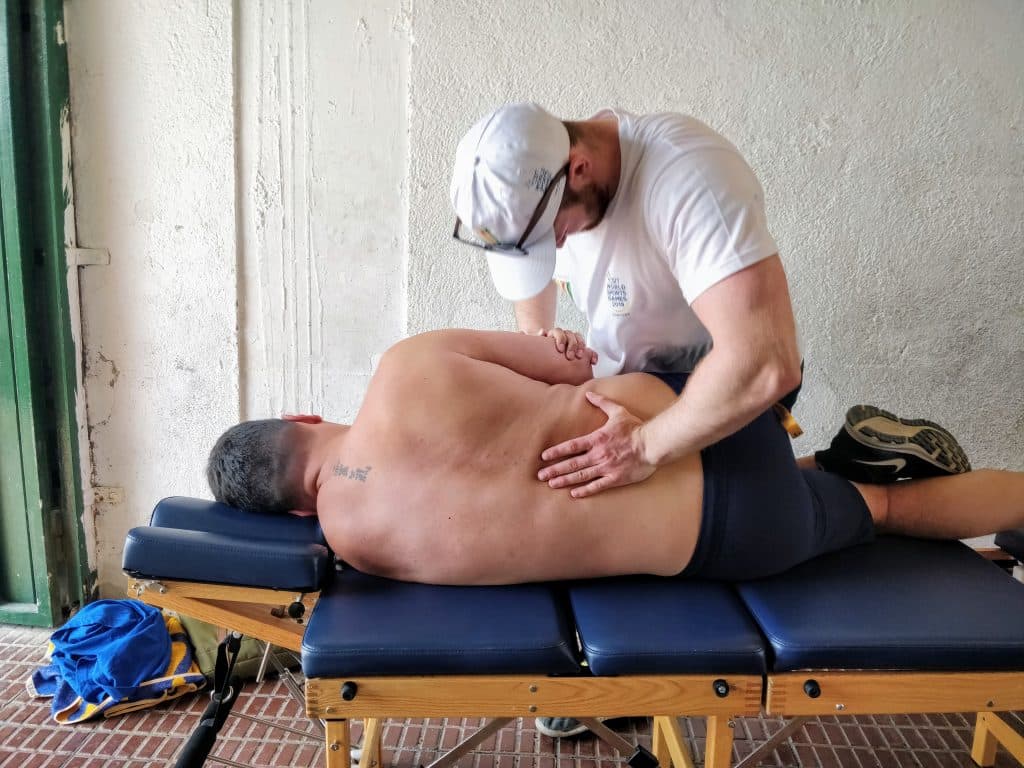 Josh French adjusting the low back to improve low back pain.