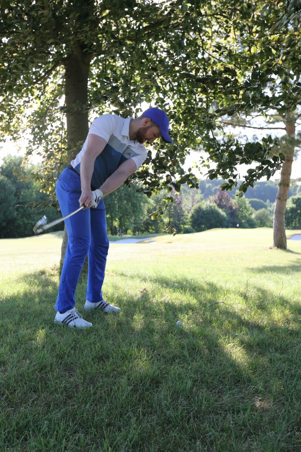 Our sports chiropractor Josh playing golf.